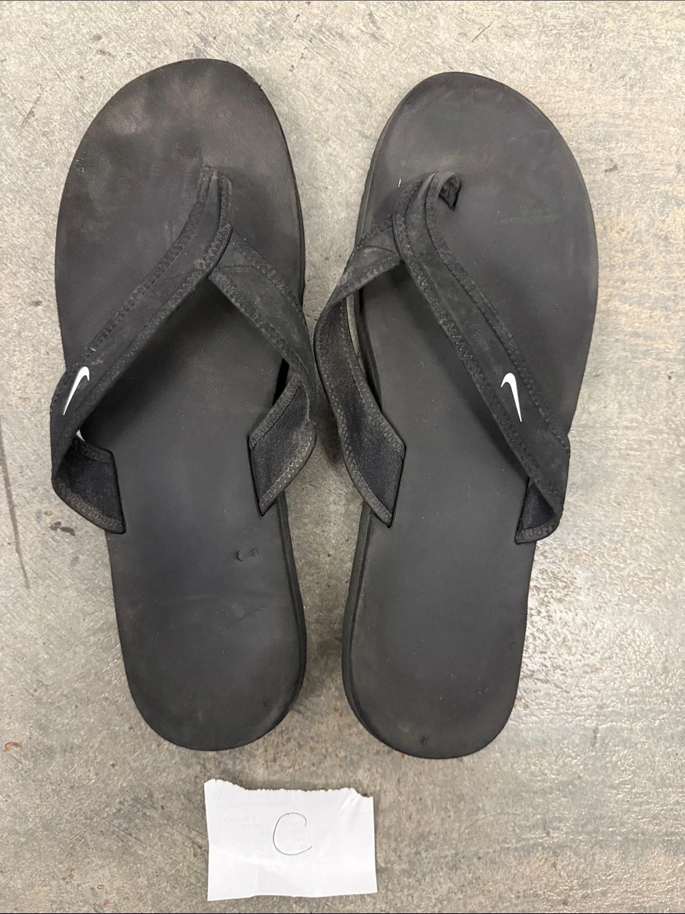 Nike Women’s Black Flip-Flop Sandals with White Swoosh